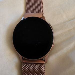 Galaxy watch 2 with magnetic band works, just need charged, charger not included